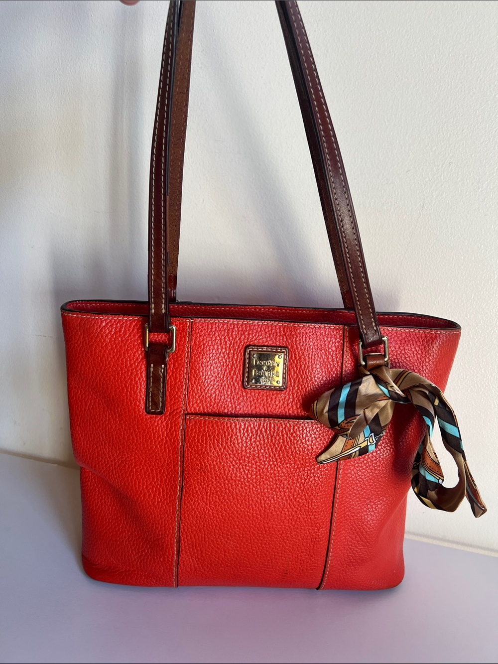 Dooney & Bourke Orange Pebble Leather Tote with Contrasted Straps & added tie